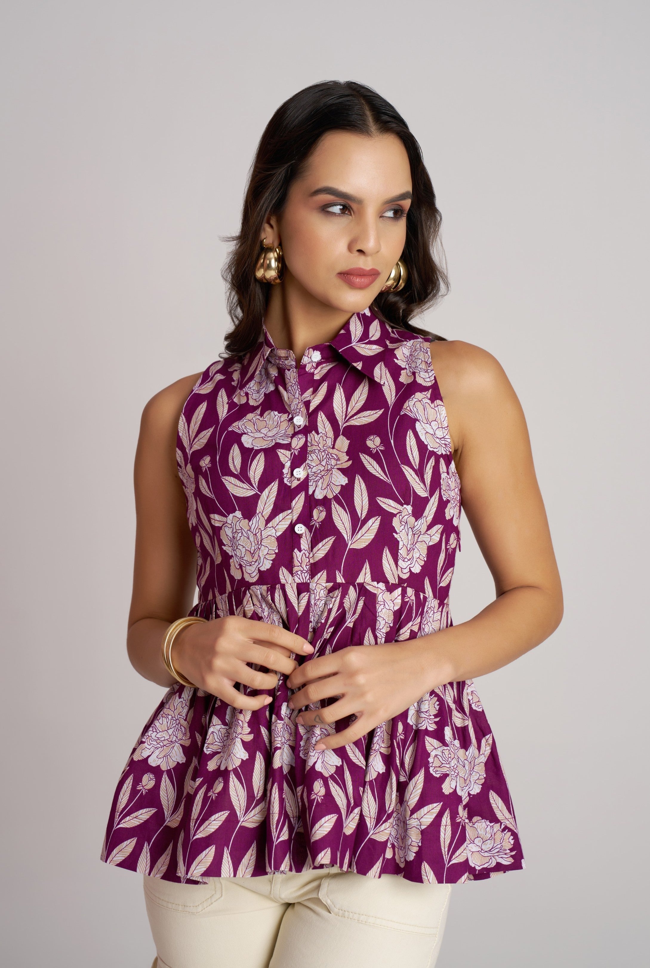 Plum Bloom Sleeveless Peplum Top