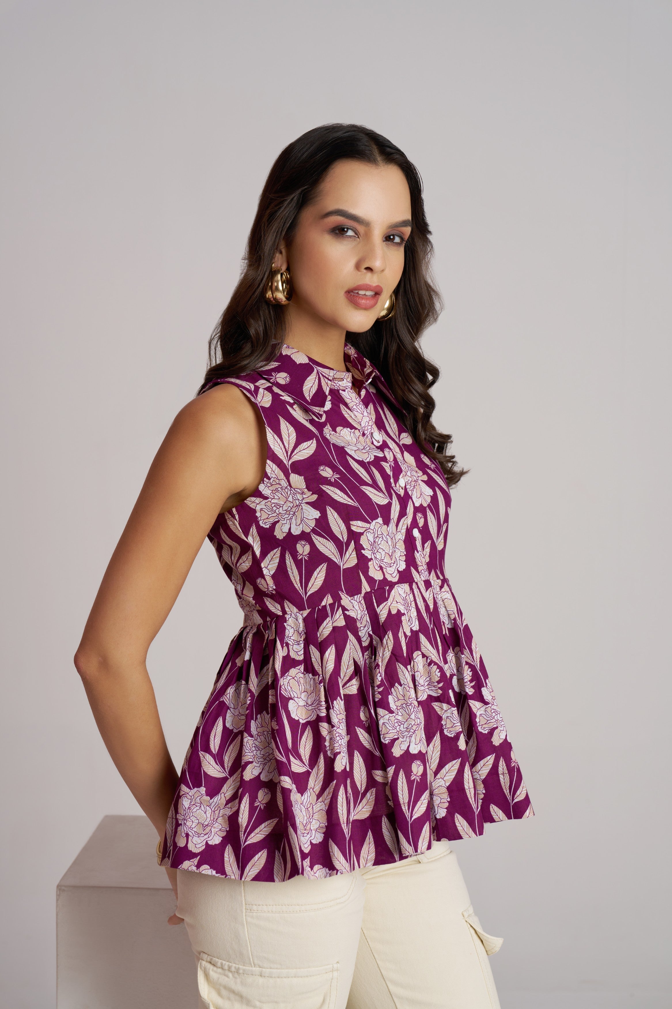 Plum Bloom Sleeveless Peplum Top